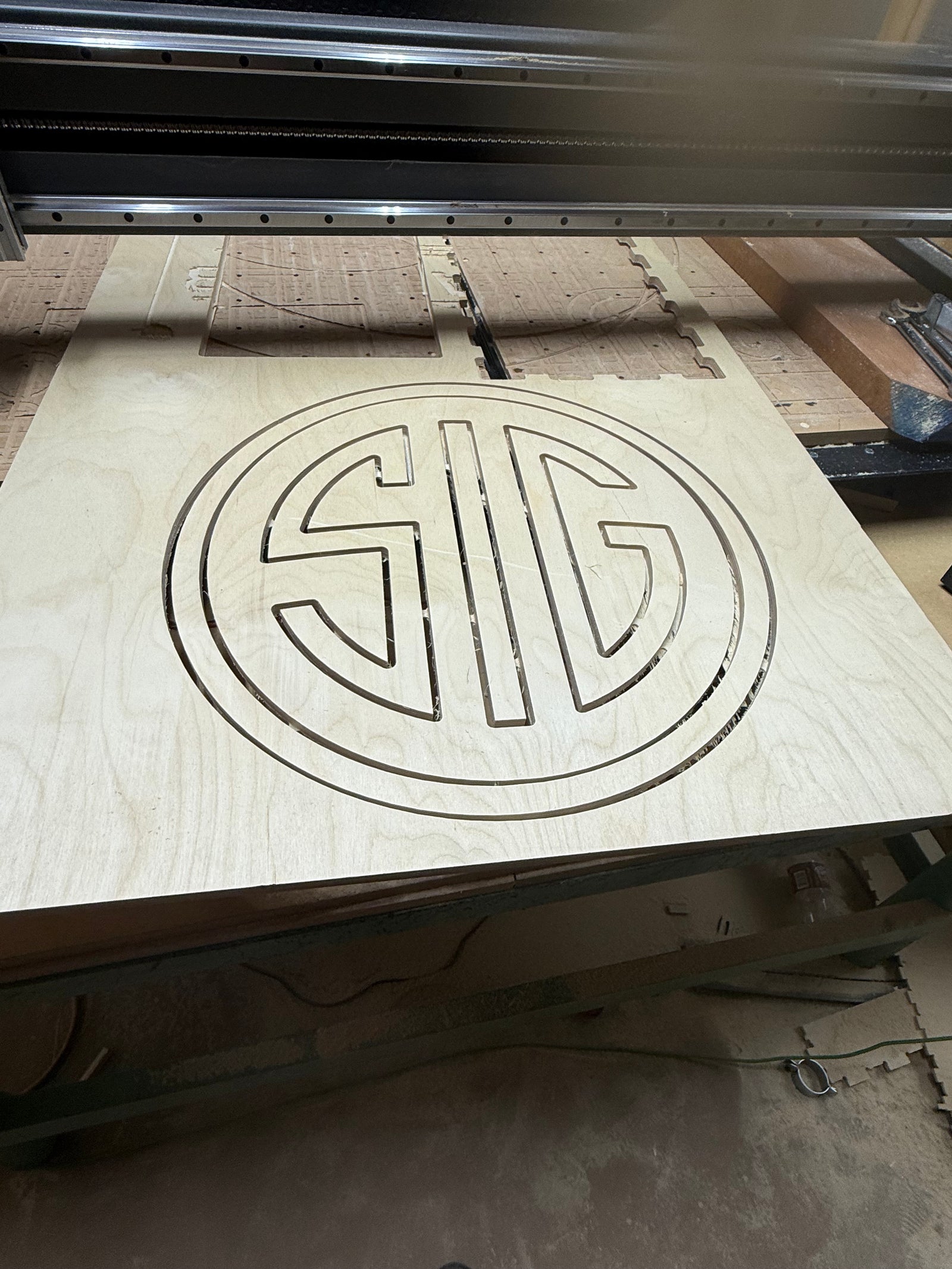 SIG-Style Round Wooden Wall Sign – 22-Inch